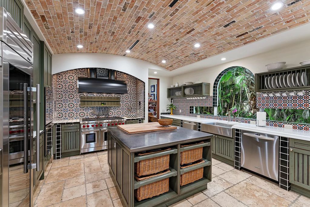 Discover the epitome of refined living at 2929 Marys Way, a Moroccan-inspired waterfront sanctuary in Palm Beach Gardens, Florida. This 5-bed, 9-bath home, remodeled in 2018, boasts 7,175 square feet of meticulously crafted living space on a sprawling 0.68-acre lot.
