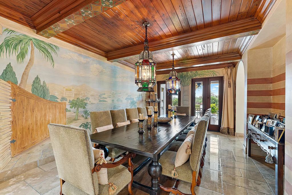 Discover the epitome of refined living at 2929 Marys Way, a Moroccan-inspired waterfront sanctuary in Palm Beach Gardens, Florida. This 5-bed, 9-bath home, remodeled in 2018, boasts 7,175 square feet of meticulously crafted living space on a sprawling 0.68-acre lot.