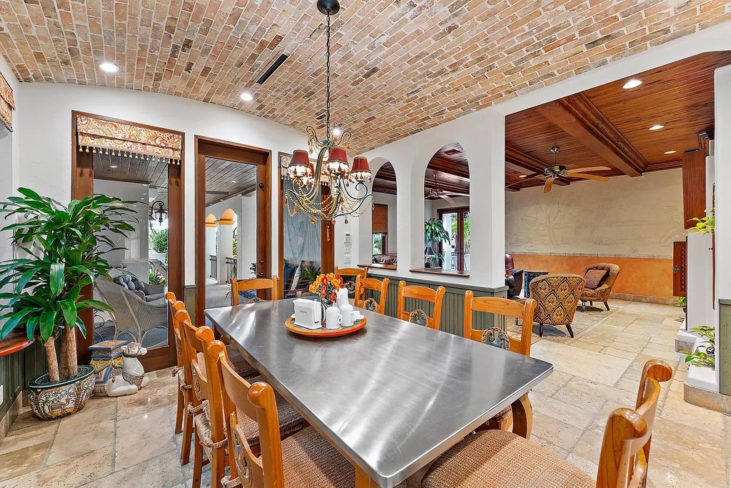 Discover the epitome of refined living at 2929 Marys Way, a Moroccan-inspired waterfront sanctuary in Palm Beach Gardens, Florida. This 5-bed, 9-bath home, remodeled in 2018, boasts 7,175 square feet of meticulously crafted living space on a sprawling 0.68-acre lot.