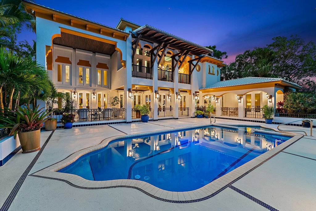 Discover the epitome of refined living at 2929 Marys Way, a Moroccan-inspired waterfront sanctuary in Palm Beach Gardens, Florida. This 5-bed, 9-bath home, remodeled in 2018, boasts 7,175 square feet of meticulously crafted living space on a sprawling 0.68-acre lot.