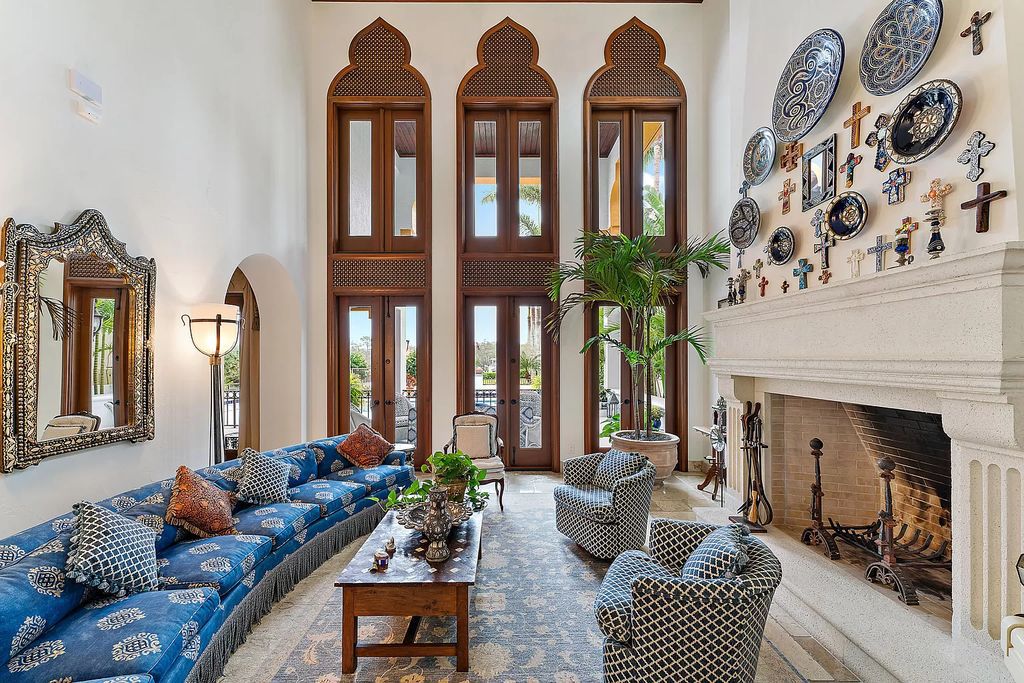 Discover the epitome of refined living at 2929 Marys Way, a Moroccan-inspired waterfront sanctuary in Palm Beach Gardens, Florida. This 5-bed, 9-bath home, remodeled in 2018, boasts 7,175 square feet of meticulously crafted living space on a sprawling 0.68-acre lot.