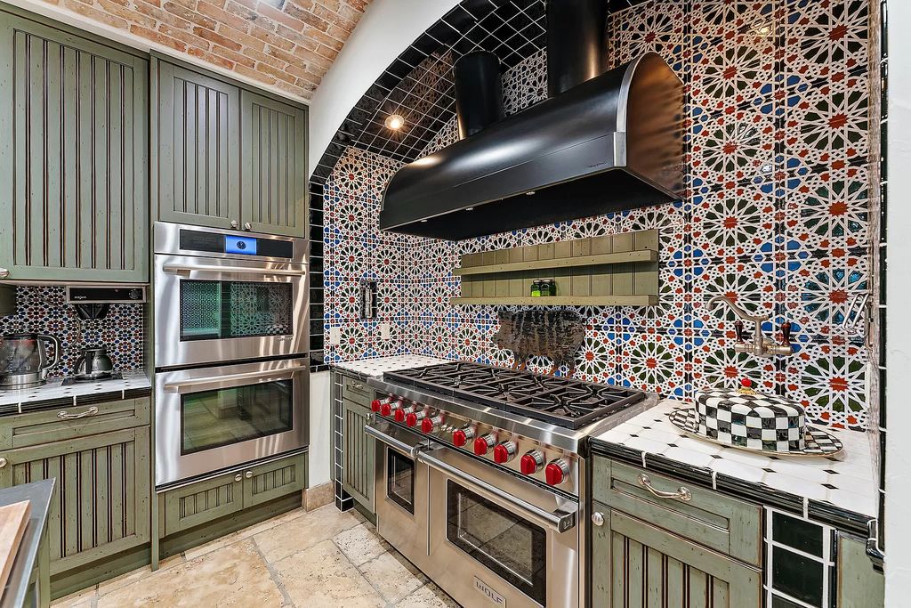 Discover the epitome of refined living at 2929 Marys Way, a Moroccan-inspired waterfront sanctuary in Palm Beach Gardens, Florida. This 5-bed, 9-bath home, remodeled in 2018, boasts 7,175 square feet of meticulously crafted living space on a sprawling 0.68-acre lot.
