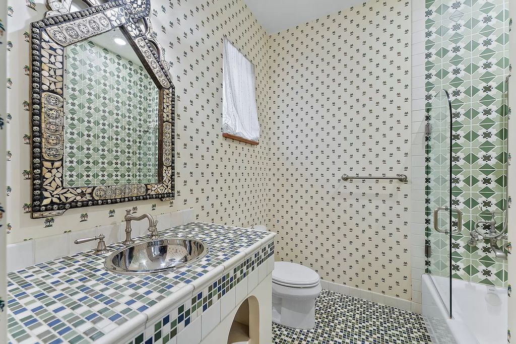 Discover the epitome of refined living at 2929 Marys Way, a Moroccan-inspired waterfront sanctuary in Palm Beach Gardens, Florida. This 5-bed, 9-bath home, remodeled in 2018, boasts 7,175 square feet of meticulously crafted living space on a sprawling 0.68-acre lot.