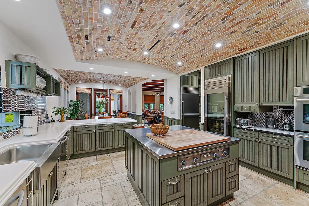 Discover the epitome of refined living at 2929 Marys Way, a Moroccan-inspired waterfront sanctuary in Palm Beach Gardens, Florida. This 5-bed, 9-bath home, remodeled in 2018, boasts 7,175 square feet of meticulously crafted living space on a sprawling 0.68-acre lot.