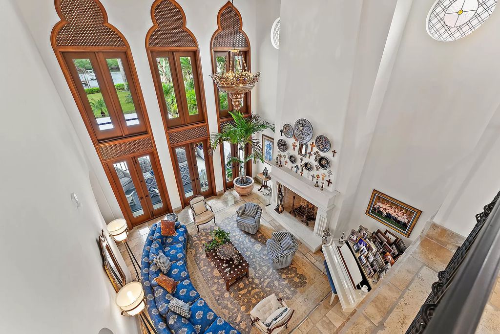 Discover the epitome of refined living at 2929 Marys Way, a Moroccan-inspired waterfront sanctuary in Palm Beach Gardens, Florida. This 5-bed, 9-bath home, remodeled in 2018, boasts 7,175 square feet of meticulously crafted living space on a sprawling 0.68-acre lot.