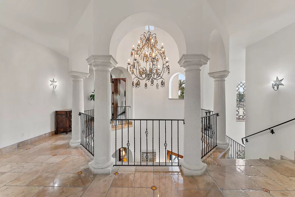 Discover the epitome of refined living at 2929 Marys Way, a Moroccan-inspired waterfront sanctuary in Palm Beach Gardens, Florida. This 5-bed, 9-bath home, remodeled in 2018, boasts 7,175 square feet of meticulously crafted living space on a sprawling 0.68-acre lot.