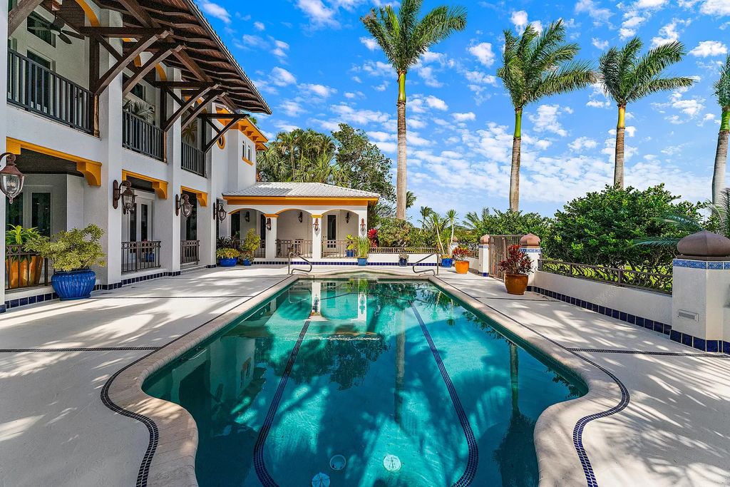 Discover the epitome of refined living at 2929 Marys Way, a Moroccan-inspired waterfront sanctuary in Palm Beach Gardens, Florida. This 5-bed, 9-bath home, remodeled in 2018, boasts 7,175 square feet of meticulously crafted living space on a sprawling 0.68-acre lot.