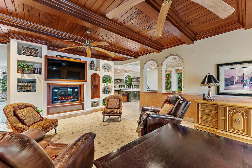 Discover the epitome of refined living at 2929 Marys Way, a Moroccan-inspired waterfront sanctuary in Palm Beach Gardens, Florida. This 5-bed, 9-bath home, remodeled in 2018, boasts 7,175 square feet of meticulously crafted living space on a sprawling 0.68-acre lot.