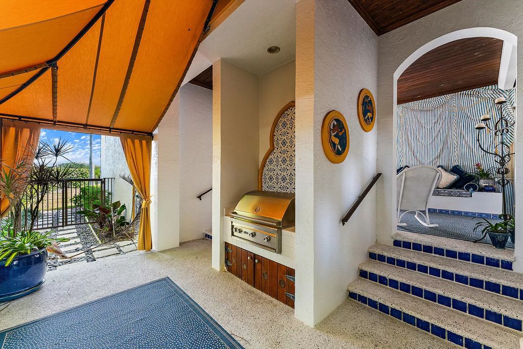 Discover the epitome of refined living at 2929 Marys Way, a Moroccan-inspired waterfront sanctuary in Palm Beach Gardens, Florida. This 5-bed, 9-bath home, remodeled in 2018, boasts 7,175 square feet of meticulously crafted living space on a sprawling 0.68-acre lot.