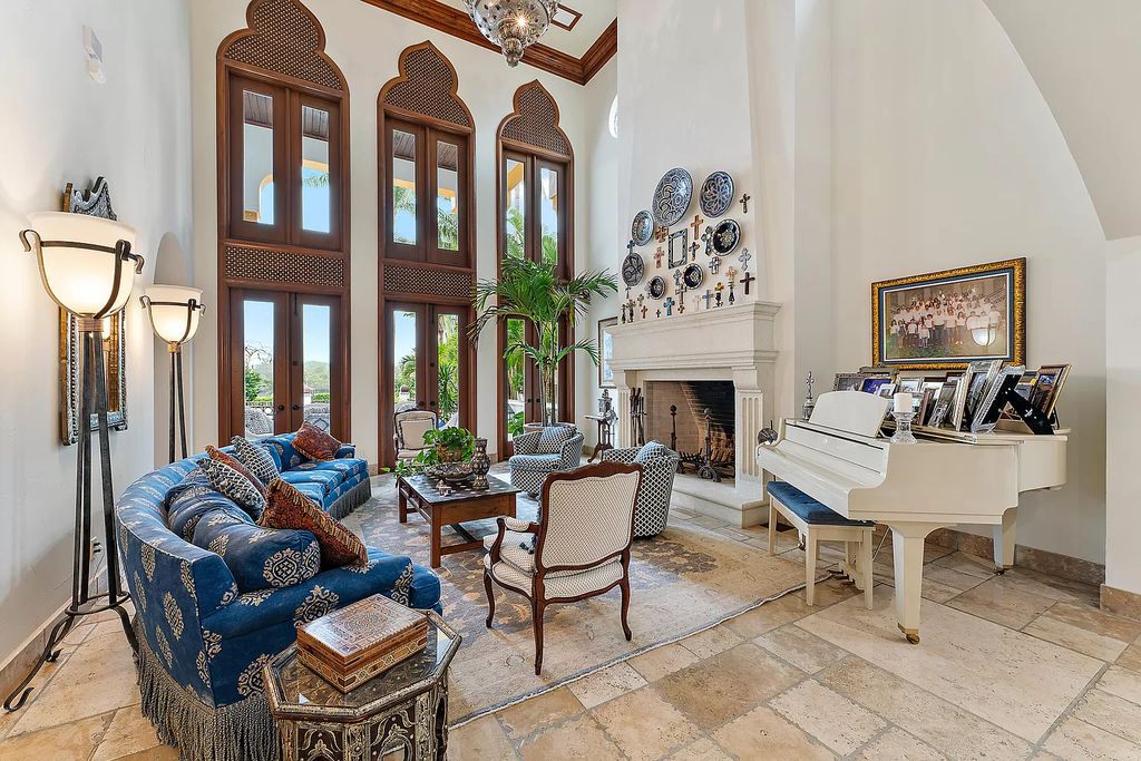 Discover the epitome of refined living at 2929 Marys Way, a Moroccan-inspired waterfront sanctuary in Palm Beach Gardens, Florida. This 5-bed, 9-bath home, remodeled in 2018, boasts 7,175 square feet of meticulously crafted living space on a sprawling 0.68-acre lot.