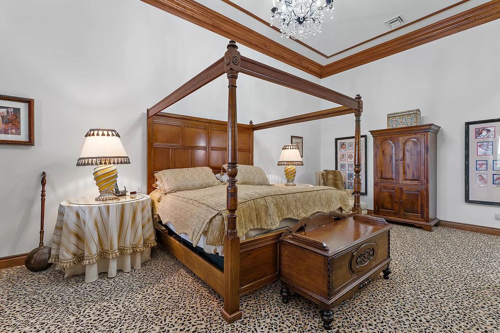 Discover the epitome of refined living at 2929 Marys Way, a Moroccan-inspired waterfront sanctuary in Palm Beach Gardens, Florida. This 5-bed, 9-bath home, remodeled in 2018, boasts 7,175 square feet of meticulously crafted living space on a sprawling 0.68-acre lot.
