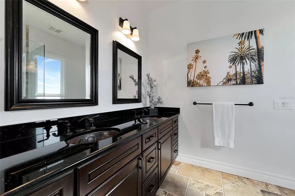 Nestled in the exclusive San Remo Estates of Sarasota, FL, 3544 San Remo Ter presents an extraordinary 8,006 square feet waterfront estate, a harmonious blend of historical charm and modern opulence.