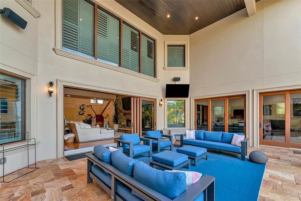 Nestled in the exclusive San Remo Estates of Sarasota, FL, 3544 San Remo Ter presents an extraordinary 8,006 square feet waterfront estate, a harmonious blend of historical charm and modern opulence.