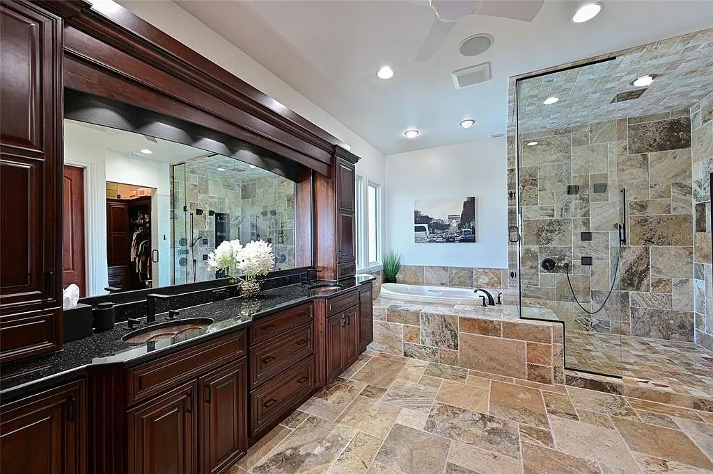 Nestled in the exclusive San Remo Estates of Sarasota, FL, 3544 San Remo Ter presents an extraordinary 8,006 square feet waterfront estate, a harmonious blend of historical charm and modern opulence.
