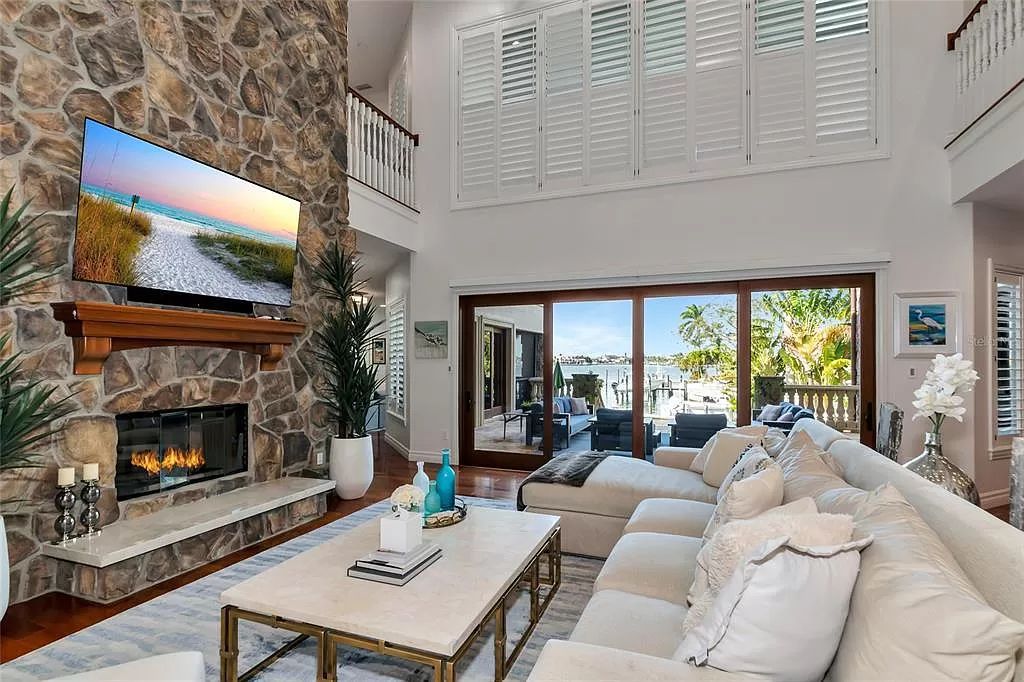 Nestled in the exclusive San Remo Estates of Sarasota, FL, 3544 San Remo Ter presents an extraordinary 8,006 square feet waterfront estate, a harmonious blend of historical charm and modern opulence.