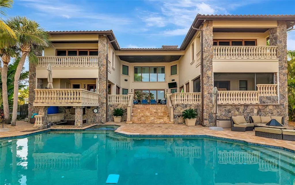 Nestled in the exclusive San Remo Estates of Sarasota, FL, 3544 San Remo Ter presents an extraordinary 8,006 square feet waterfront estate, a harmonious blend of historical charm and modern opulence.