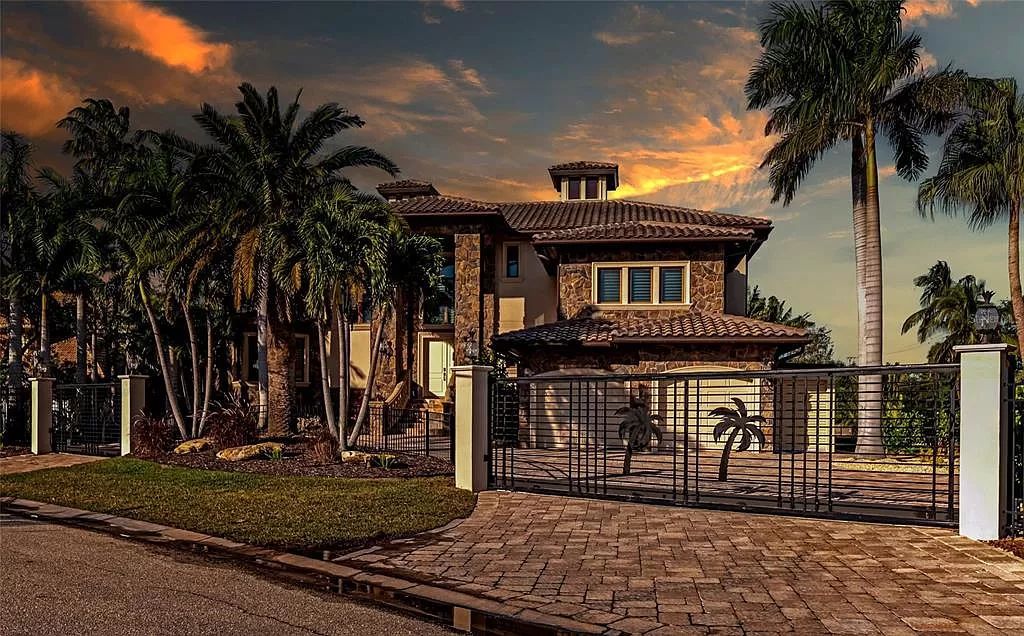 Nestled in the exclusive San Remo Estates of Sarasota, FL, 3544 San Remo Ter presents an extraordinary 8,006 square feet waterfront estate, a harmonious blend of historical charm and modern opulence.