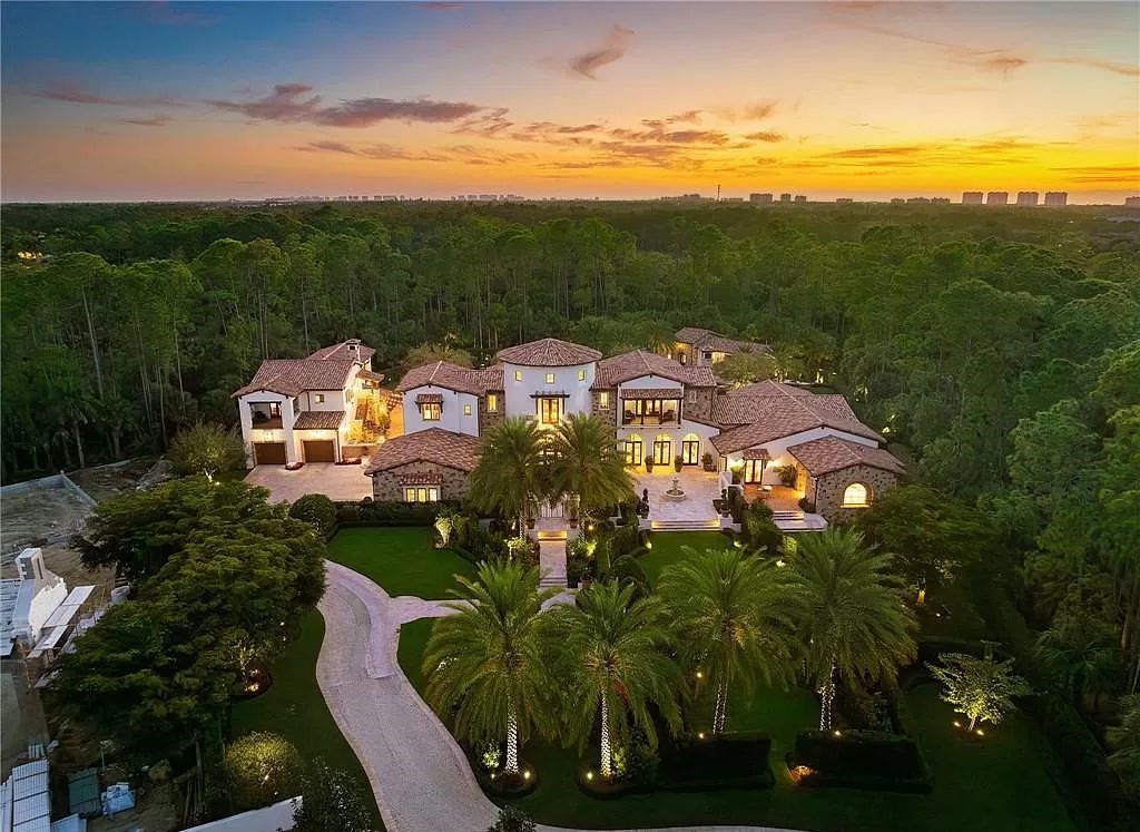 Crafted by London Bay Homes, this 5-bedroom, 8-bathroom masterpiece spans 11,408 square feet on a 1.78-acre lot within the prestigious Mediterra community.