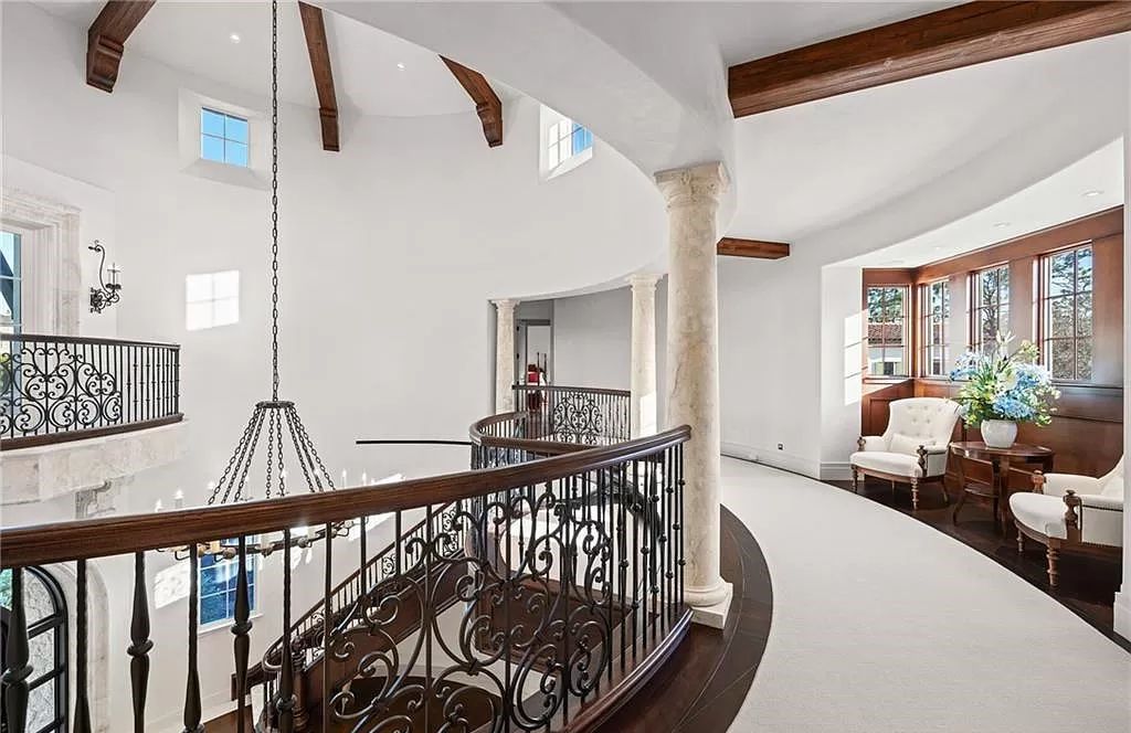 Crafted by London Bay Homes, this 5-bedroom, 8-bathroom masterpiece spans 11,408 square feet on a 1.78-acre lot within the prestigious Mediterra community.