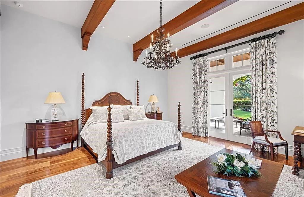Crafted by London Bay Homes, this 5-bedroom, 8-bathroom masterpiece spans 11,408 square feet on a 1.78-acre lot within the prestigious Mediterra community.