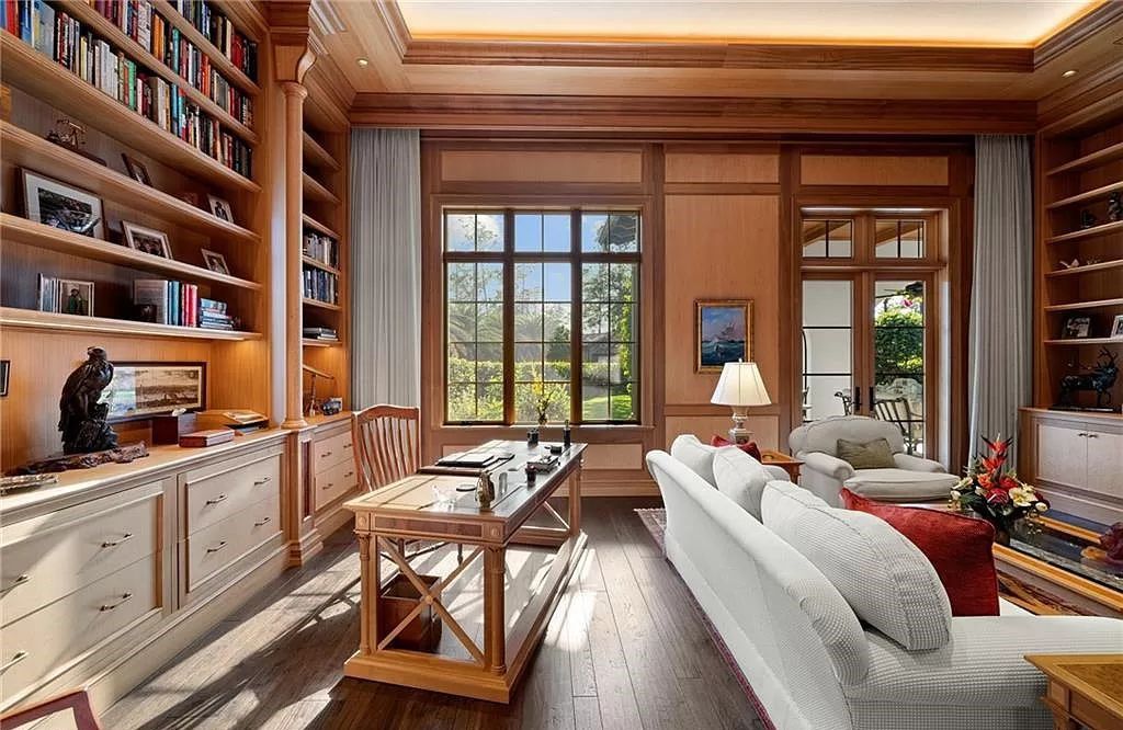 Crafted by London Bay Homes, this 5-bedroom, 8-bathroom masterpiece spans 11,408 square feet on a 1.78-acre lot within the prestigious Mediterra community.