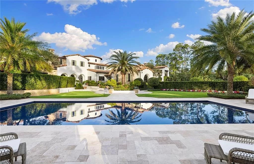 Crafted by London Bay Homes, this 5-bedroom, 8-bathroom masterpiece spans 11,408 square feet on a 1.78-acre lot within the prestigious Mediterra community.