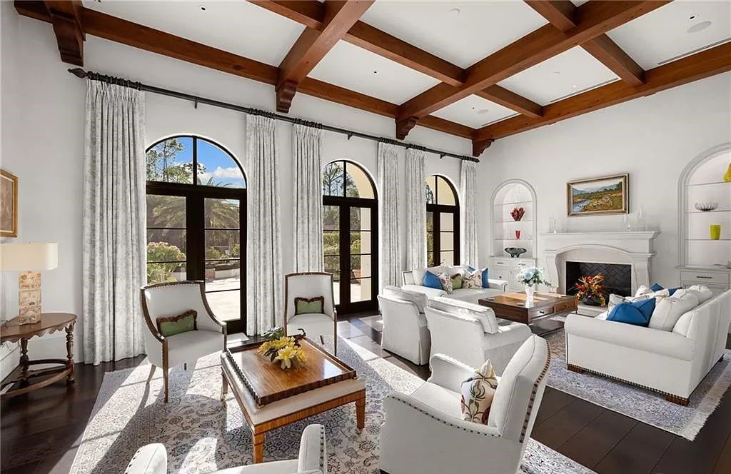 Crafted by London Bay Homes, this 5-bedroom, 8-bathroom masterpiece spans 11,408 square feet on a 1.78-acre lot within the prestigious Mediterra community.