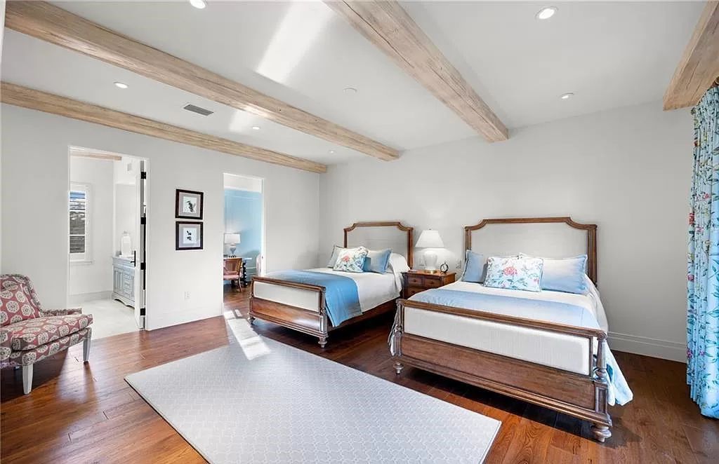 Crafted by London Bay Homes, this 5-bedroom, 8-bathroom masterpiece spans 11,408 square feet on a 1.78-acre lot within the prestigious Mediterra community.