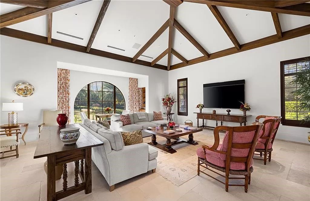 Crafted by London Bay Homes, this 5-bedroom, 8-bathroom masterpiece spans 11,408 square feet on a 1.78-acre lot within the prestigious Mediterra community.