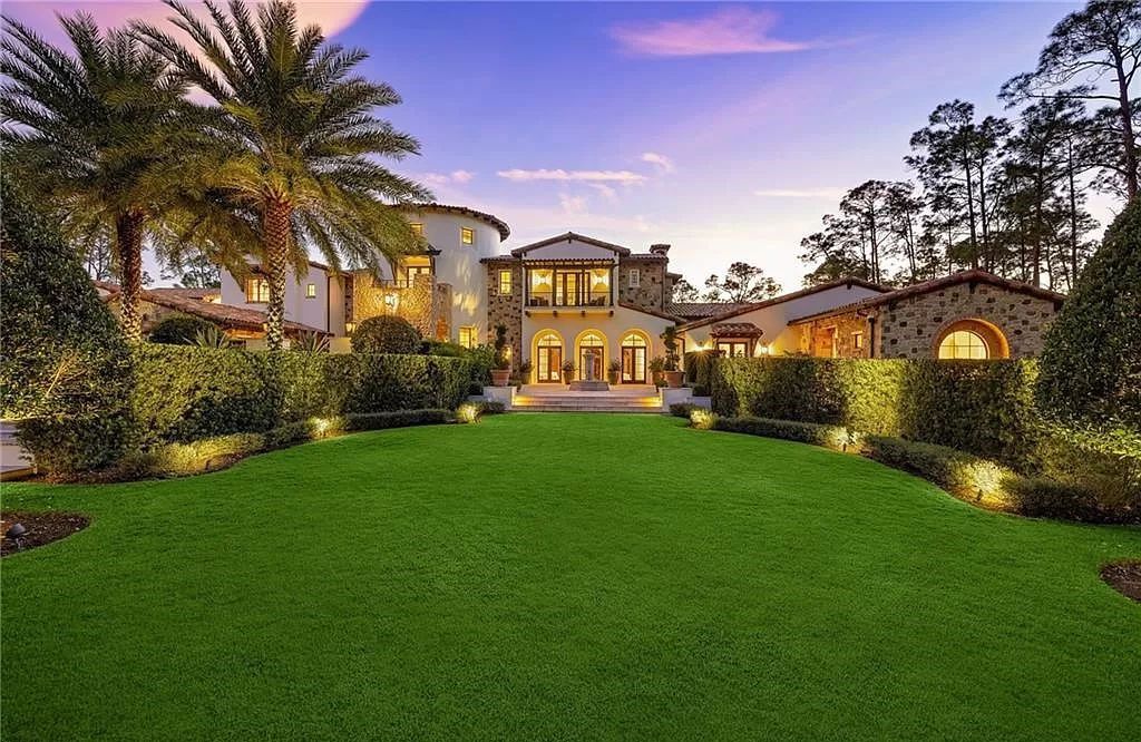 Crafted by London Bay Homes, this 5-bedroom, 8-bathroom masterpiece spans 11,408 square feet on a 1.78-acre lot within the prestigious Mediterra community.