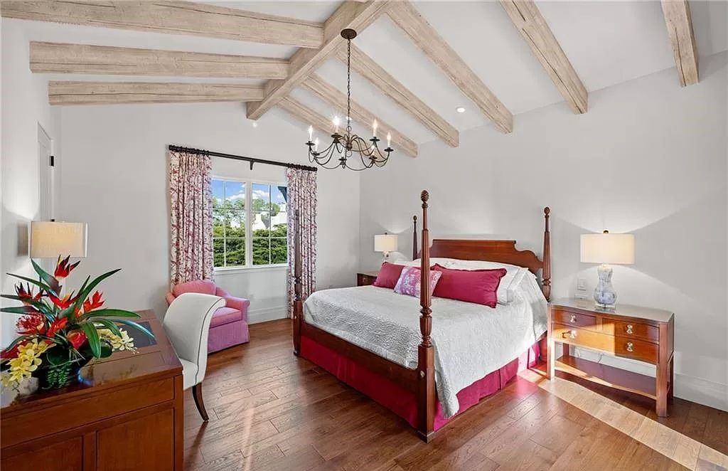 Crafted by London Bay Homes, this 5-bedroom, 8-bathroom masterpiece spans 11,408 square feet on a 1.78-acre lot within the prestigious Mediterra community.