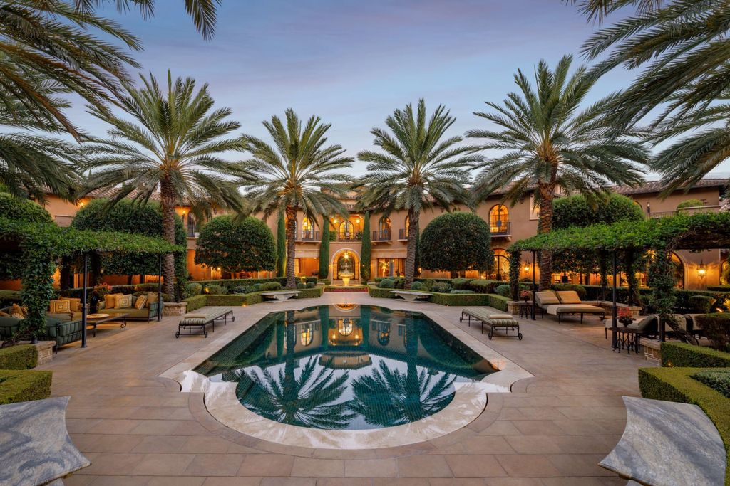 38 Beverly Park Circle Home in Beverly Hills, California. Explore the enchanting Tuscan Villa in the prestigious guard-gated enclave of Beverly Park. This Robert Sinclair masterpiece offers 5 bedrooms, 11 bathrooms, and a host of luxurious features. Nestled on nearly 3 acres, the property boasts mature trees, fountains, and serene walkways.