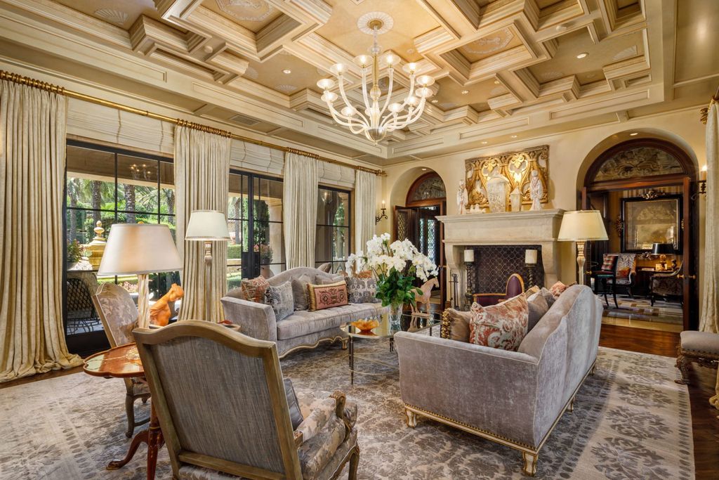 38 Beverly Park Circle Home in Beverly Hills, California. Explore the enchanting Tuscan Villa in the prestigious guard-gated enclave of Beverly Park. This Robert Sinclair masterpiece offers 5 bedrooms, 11 bathrooms, and a host of luxurious features. Nestled on nearly 3 acres, the property boasts mature trees, fountains, and serene walkways.