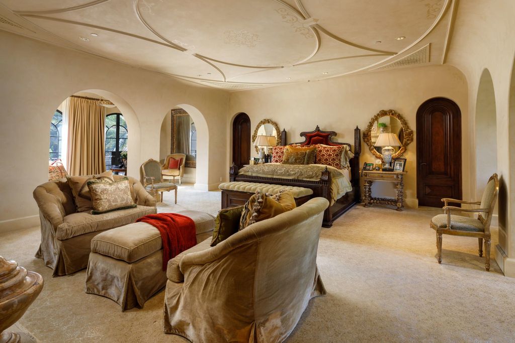 38 Beverly Park Circle Home in Beverly Hills, California. Explore the enchanting Tuscan Villa in the prestigious guard-gated enclave of Beverly Park. This Robert Sinclair masterpiece offers 5 bedrooms, 11 bathrooms, and a host of luxurious features. Nestled on nearly 3 acres, the property boasts mature trees, fountains, and serene walkways.