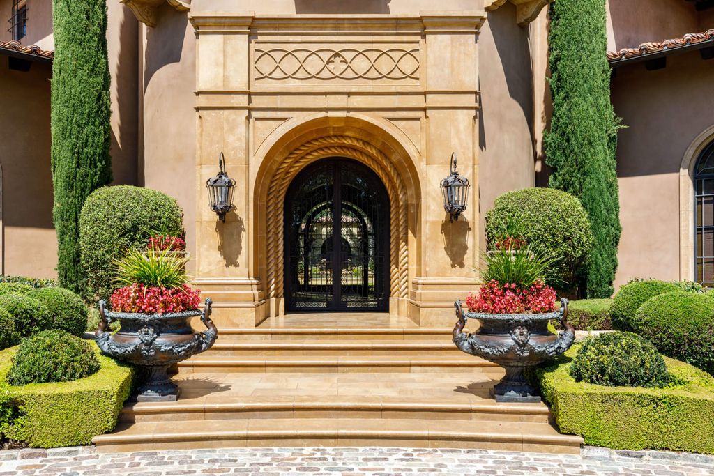 38 Beverly Park Circle Home in Beverly Hills, California. Explore the enchanting Tuscan Villa in the prestigious guard-gated enclave of Beverly Park. This Robert Sinclair masterpiece offers 5 bedrooms, 11 bathrooms, and a host of luxurious features. Nestled on nearly 3 acres, the property boasts mature trees, fountains, and serene walkways.