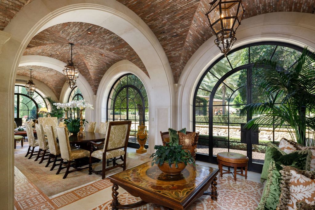 38 Beverly Park Circle Home in Beverly Hills, California. Explore the enchanting Tuscan Villa in the prestigious guard-gated enclave of Beverly Park. This Robert Sinclair masterpiece offers 5 bedrooms, 11 bathrooms, and a host of luxurious features. Nestled on nearly 3 acres, the property boasts mature trees, fountains, and serene walkways.
