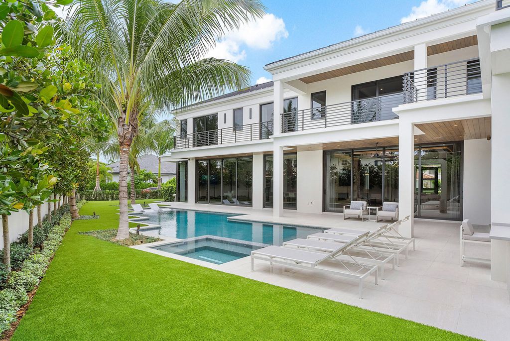 484 Royal Palm Way Home in Boca Raton, Florida. Discover the pinnacle of opulence in Boca Raton with this stunning Signature Estate by SRD Building Corp. Located in the prestigious Royal Palm Yacht & Country Club, this exquisite property offers six bedroom suites, 7 full and 2 half bathrooms, and unparalleled features like a Crestron smart-home system.