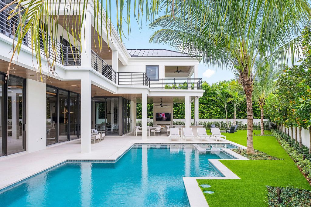 484 Royal Palm Way Home in Boca Raton, Florida. Discover the pinnacle of opulence in Boca Raton with this stunning Signature Estate by SRD Building Corp. Located in the prestigious Royal Palm Yacht & Country Club, this exquisite property offers six bedroom suites, 7 full and 2 half bathrooms, and unparalleled features like a Crestron smart-home system.