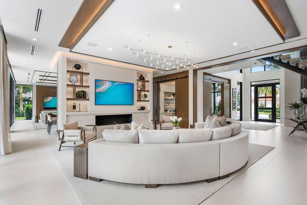 484 Royal Palm Way Home in Boca Raton, Florida. Discover the pinnacle of opulence in Boca Raton with this stunning Signature Estate by SRD Building Corp. Located in the prestigious Royal Palm Yacht & Country Club, this exquisite property offers six bedroom suites, 7 full and 2 half bathrooms, and unparalleled features like a Crestron smart-home system.