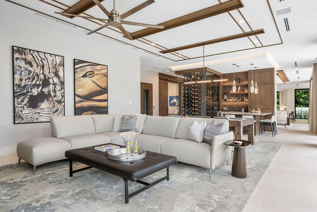 484 Royal Palm Way Home in Boca Raton, Florida. Discover the pinnacle of opulence in Boca Raton with this stunning Signature Estate by SRD Building Corp. Located in the prestigious Royal Palm Yacht & Country Club, this exquisite property offers six bedroom suites, 7 full and 2 half bathrooms, and unparalleled features like a Crestron smart-home system.