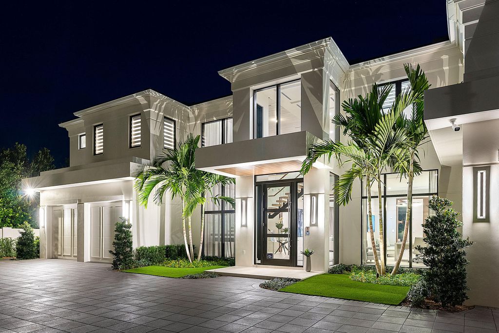 484 Royal Palm Way Home in Boca Raton, Florida. Discover the pinnacle of opulence in Boca Raton with this stunning Signature Estate by SRD Building Corp. Located in the prestigious Royal Palm Yacht & Country Club, this exquisite property offers six bedroom suites, 7 full and 2 half bathrooms, and unparalleled features like a Crestron smart-home system.