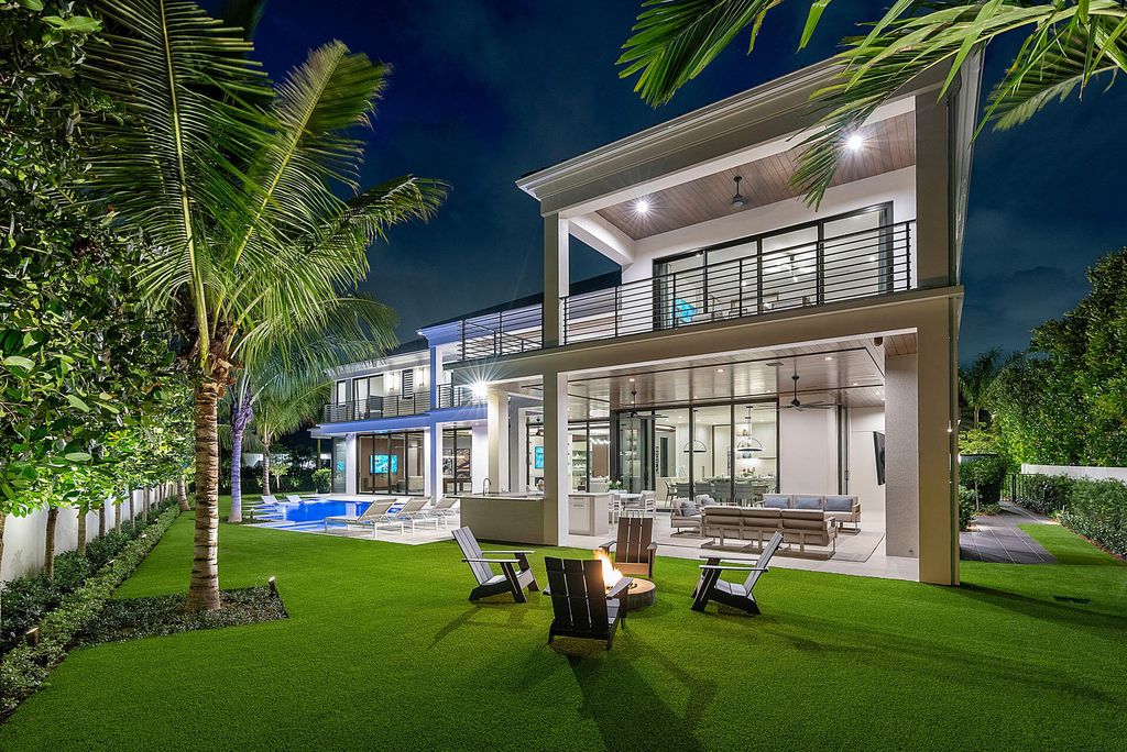 484 Royal Palm Way Home in Boca Raton, Florida. Discover the pinnacle of opulence in Boca Raton with this stunning Signature Estate by SRD Building Corp. Located in the prestigious Royal Palm Yacht & Country Club, this exquisite property offers six bedroom suites, 7 full and 2 half bathrooms, and unparalleled features like a Crestron smart-home system.