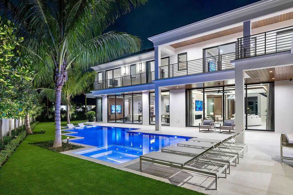 484 Royal Palm Way Home in Boca Raton, Florida. Discover the pinnacle of opulence in Boca Raton with this stunning Signature Estate by SRD Building Corp. Located in the prestigious Royal Palm Yacht & Country Club, this exquisite property offers six bedroom suites, 7 full and 2 half bathrooms, and unparalleled features like a Crestron smart-home system.