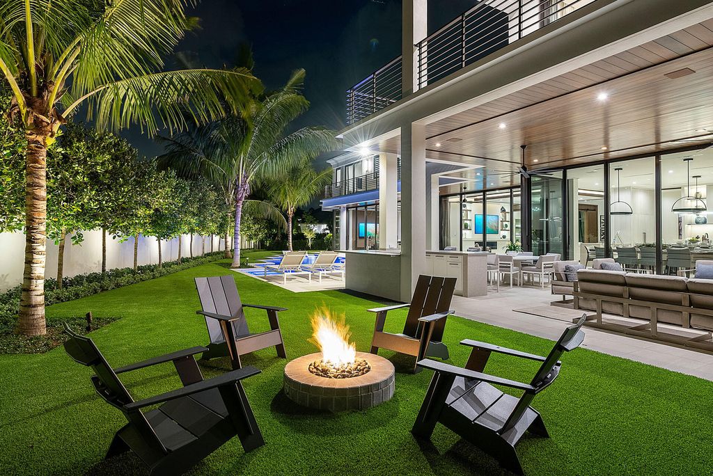 484 Royal Palm Way Home in Boca Raton, Florida. Discover the pinnacle of opulence in Boca Raton with this stunning Signature Estate by SRD Building Corp. Located in the prestigious Royal Palm Yacht & Country Club, this exquisite property offers six bedroom suites, 7 full and 2 half bathrooms, and unparalleled features like a Crestron smart-home system.