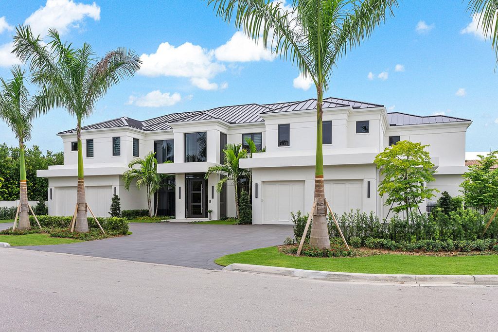 484 Royal Palm Way Home in Boca Raton, Florida. Discover the pinnacle of opulence in Boca Raton with this stunning Signature Estate by SRD Building Corp. Located in the prestigious Royal Palm Yacht & Country Club, this exquisite property offers six bedroom suites, 7 full and 2 half bathrooms, and unparalleled features like a Crestron smart-home system.