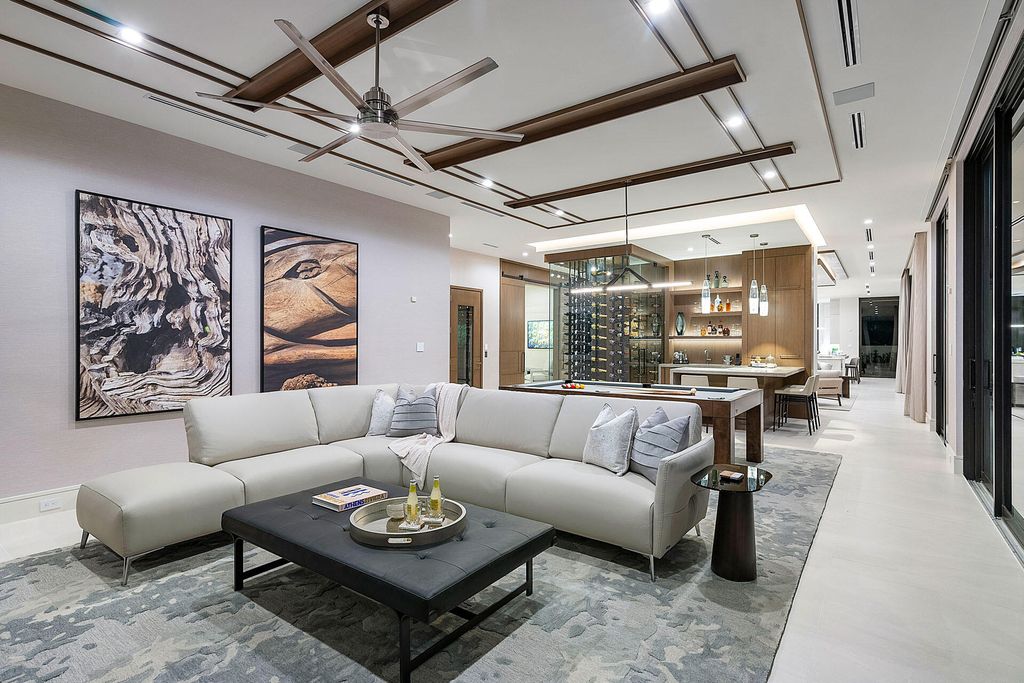 484 Royal Palm Way Home in Boca Raton, Florida. Discover the pinnacle of opulence in Boca Raton with this stunning Signature Estate by SRD Building Corp. Located in the prestigious Royal Palm Yacht & Country Club, this exquisite property offers six bedroom suites, 7 full and 2 half bathrooms, and unparalleled features like a Crestron smart-home system.