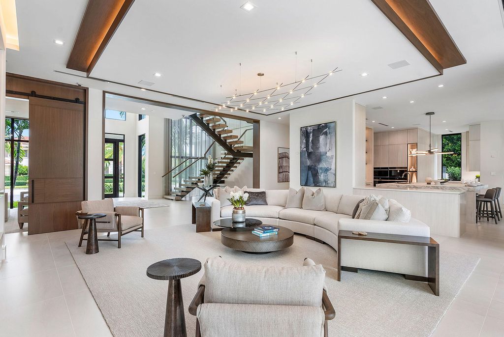 484 Royal Palm Way Home in Boca Raton, Florida. Discover the pinnacle of opulence in Boca Raton with this stunning Signature Estate by SRD Building Corp. Located in the prestigious Royal Palm Yacht & Country Club, this exquisite property offers six bedroom suites, 7 full and 2 half bathrooms, and unparalleled features like a Crestron smart-home system.