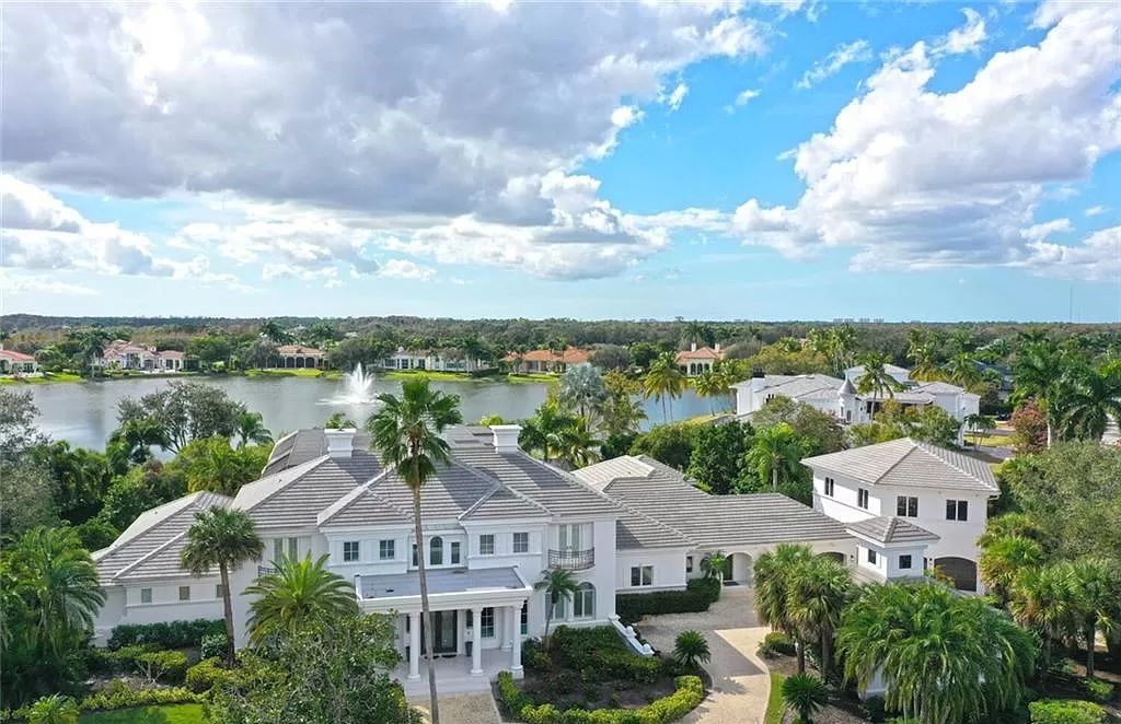 Welcome to Sunspray Estate, an exquisite 5-bedroom masterpiece nestled along the shores of a secluded spring-fed lake in Naples, Florida.