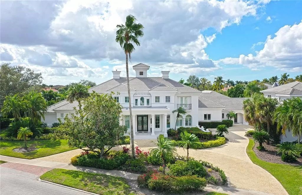 Welcome to Sunspray Estate, an exquisite 5-bedroom masterpiece nestled along the shores of a secluded spring-fed lake in Naples, Florida.