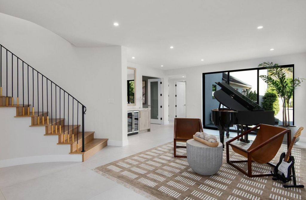 6665 Via Estrada Home in La Jolla, California. Step into the lap of luxury with this opulent residence in La Jolla, boasting over 6,000 square feet of meticulously designed space. Immerse yourself in sophistication with six en suite bedrooms, high-end finishes, and grand living areas.